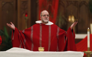 Fr Jim saying Mass